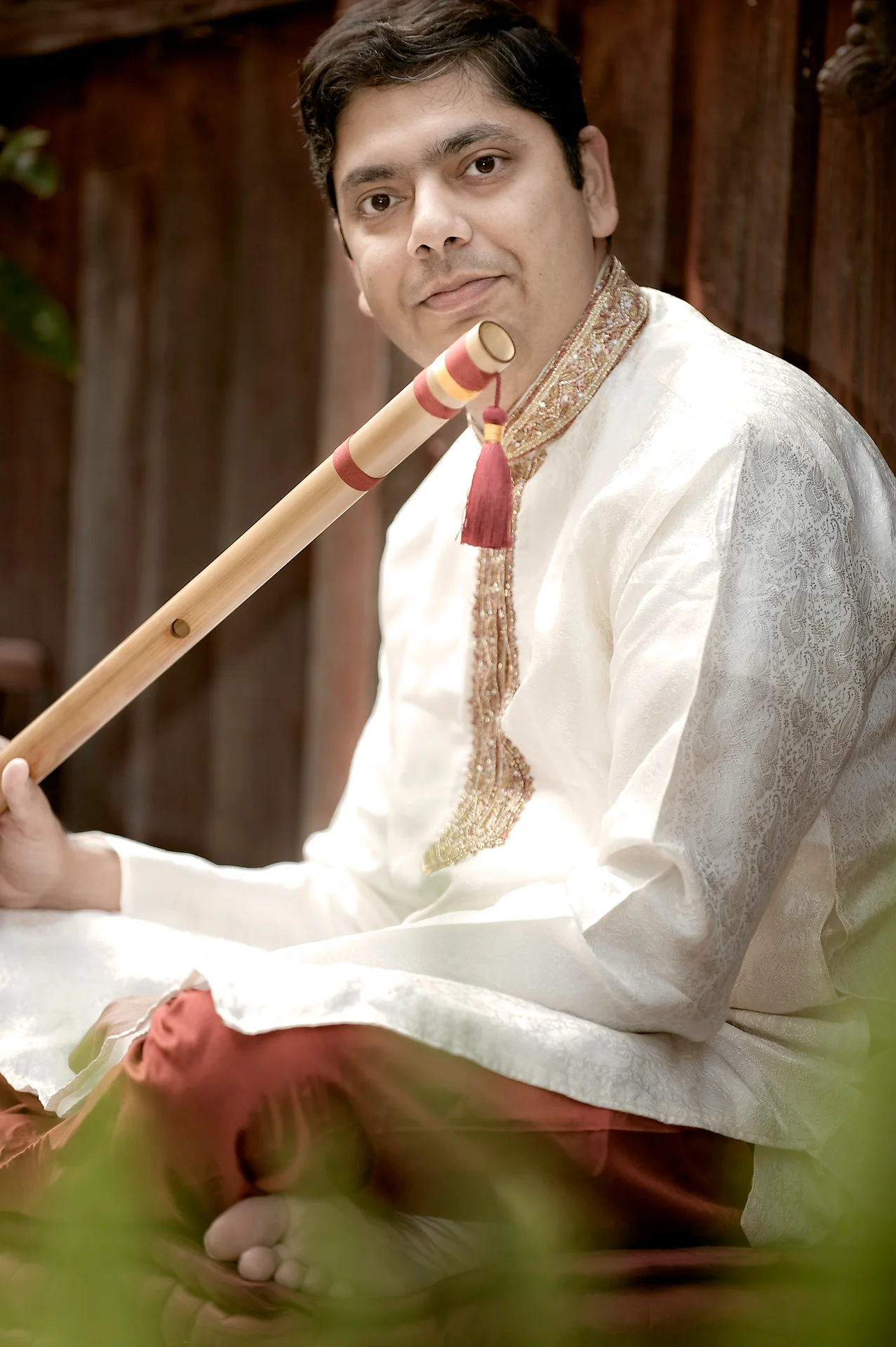 Prasad playing bansuri outdoors
